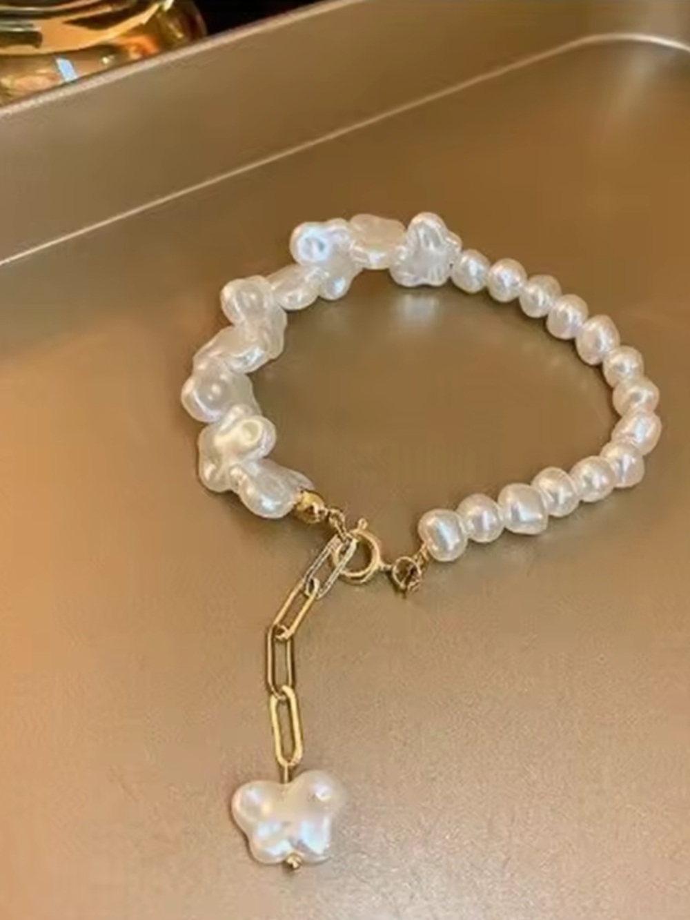 Freshwater Pearl Bracelet with Gold Chain Drop.